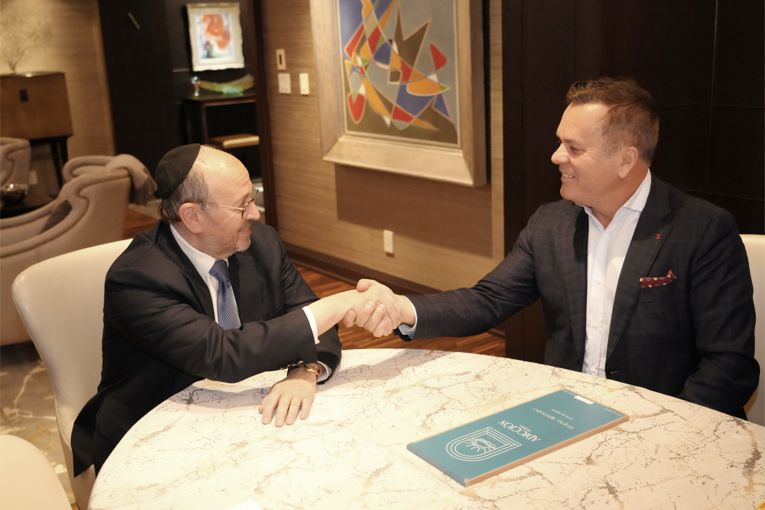 banner featuring Mark Mandelbaum, Chairman of Lanterra Developments with Michael Dabic, co-owner of Salt Grass & Rare